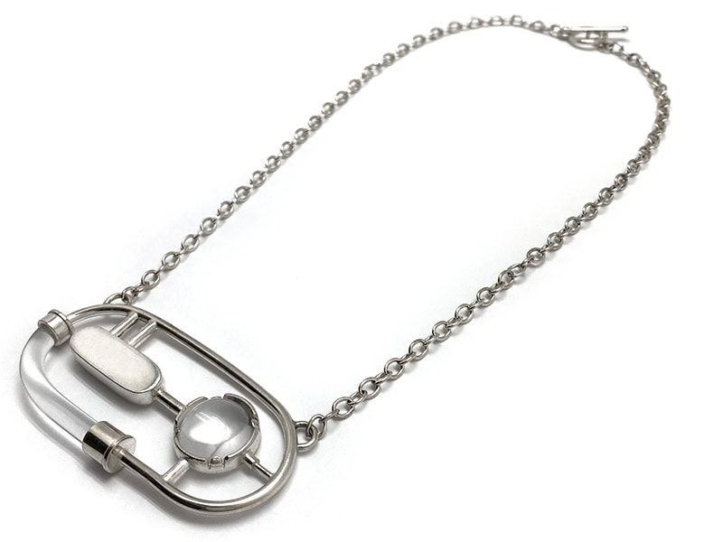 Laurel Fulton, Necklace, in sterling silver, acrylic, approximately 18 inches (457 mm) long, pendant 2 ¾ x 1 ¼ inches (70 x 32 mm), photo: Pistachios