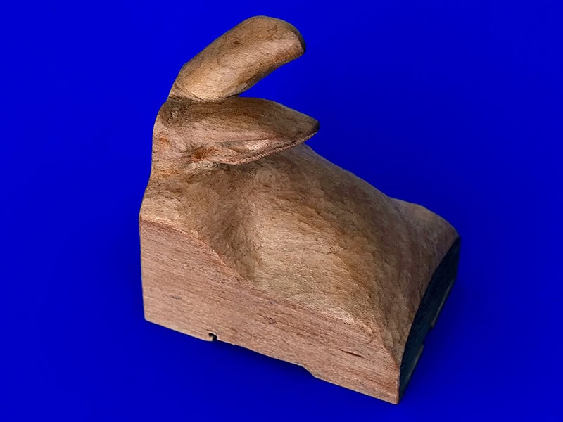 Jutta Kallfelz, William, 2024, brooch in carved pear wood, stainless steel, 2 x 1 ¼ x 2 ⅜ inches (50 x 32 x 60 mm), photo: artist